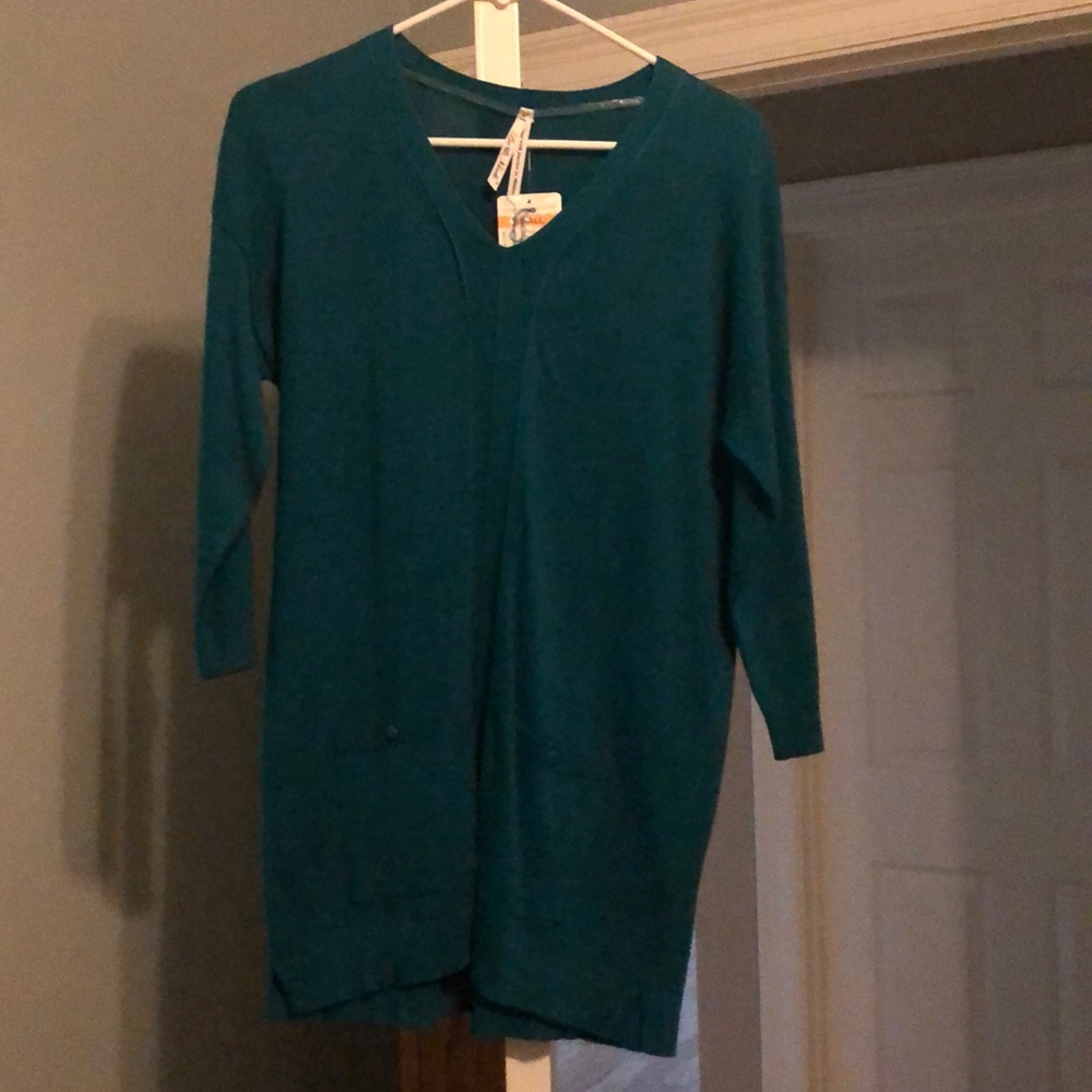 Long sweater with pockets